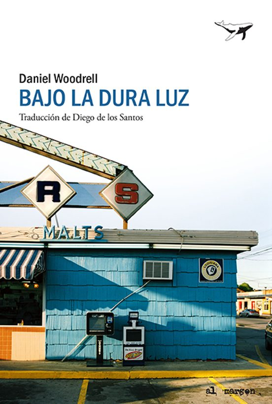 BAJO LA DURA LUZ de DANIEL WOODRELL